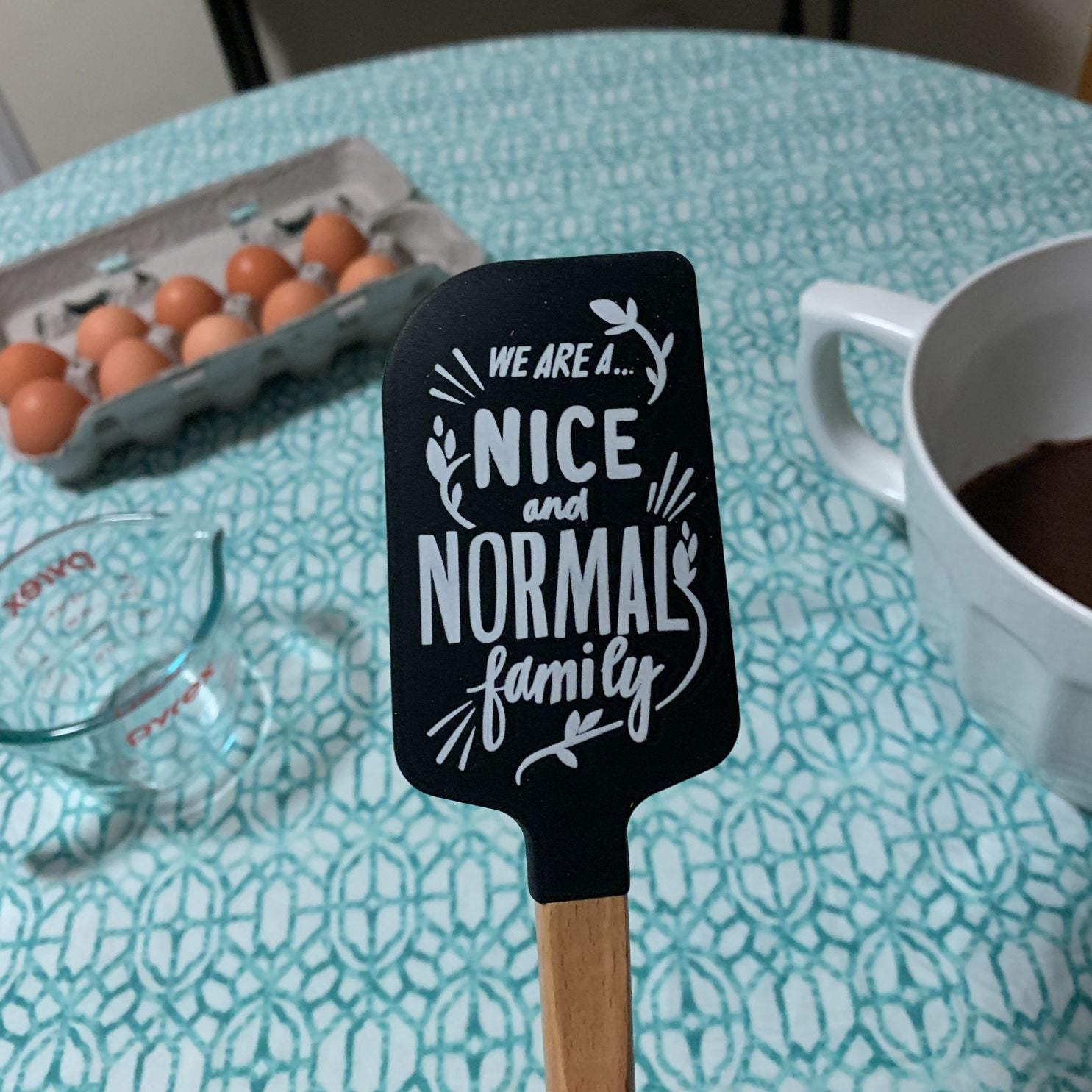 As Far As Anyone Knows We Are A Nice And Normal Family Spatula With A Wooden Handle by The Bullish Store