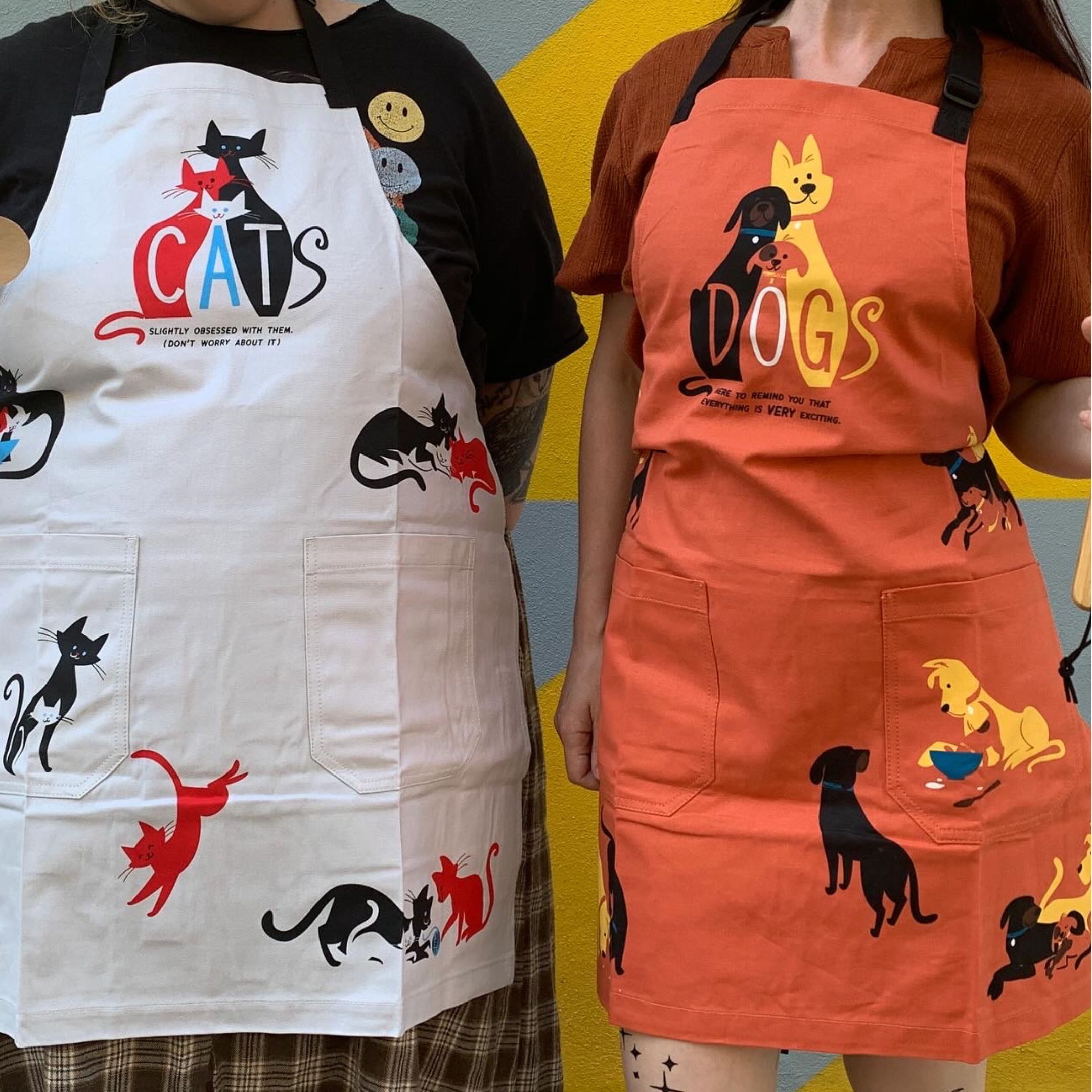 Dogs. Here To Remind You That Everything Is Exciting Funny Cooking and BBQ Apron Unisex 2 Pockets Adjustable Strap 100% Cotton | BlueQ at GetBullish by The Bullish Store